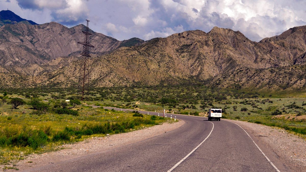 Vehicle travelling along a scenic mountain road